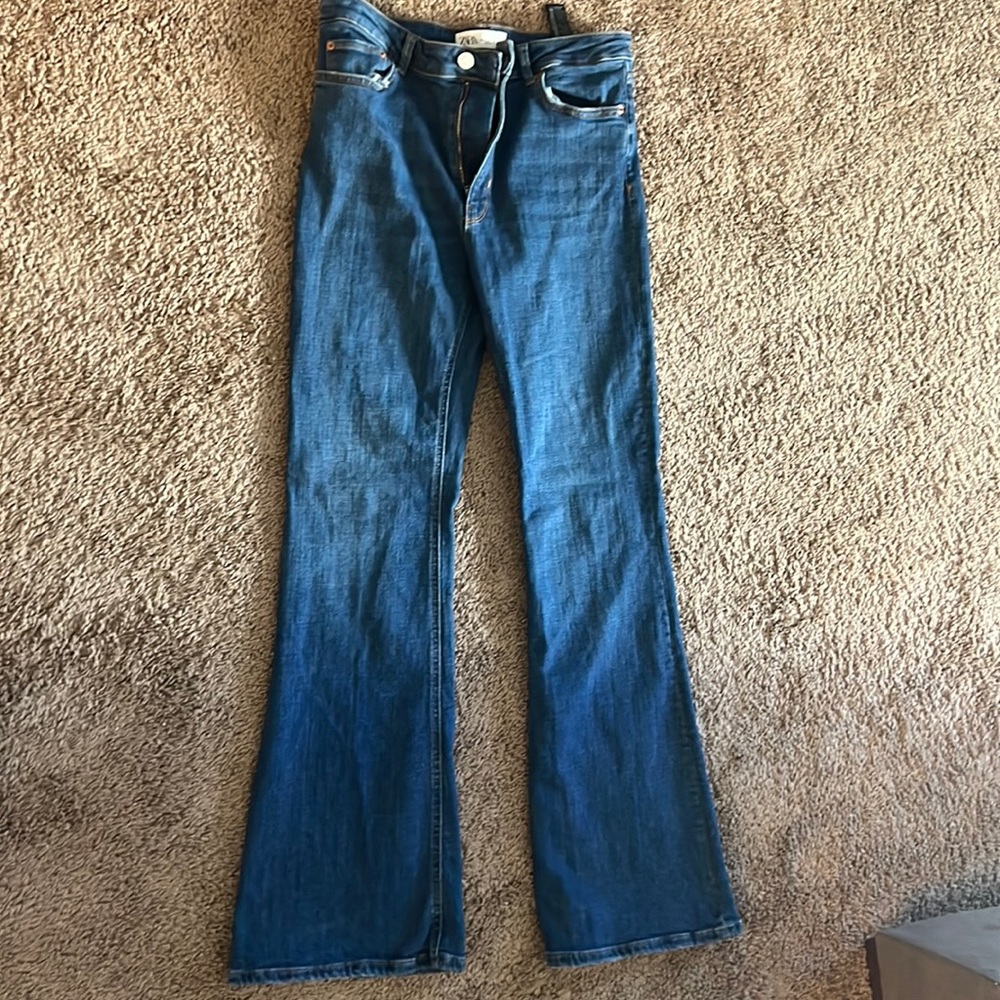 Dark denim flare jeans. Size 8 Zara.